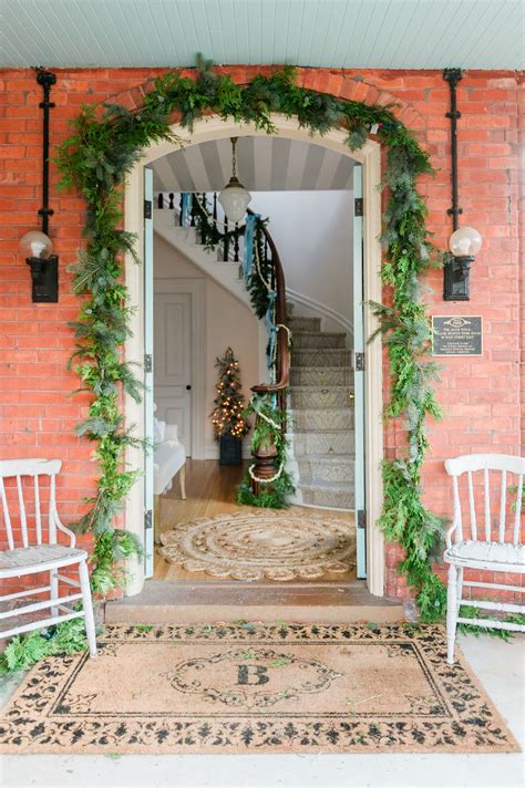 christmas entryway garland around doorway - The Leslie Style
