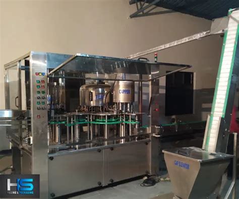 Ss 304 Grade Bottle Filling Machine Power Consumption 3 4 Hp Filling Range 200 Ml To 2 Ltr