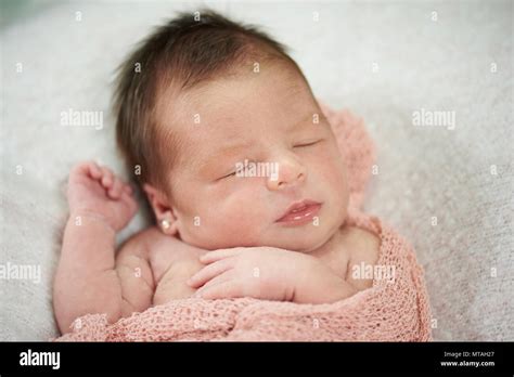 Portrait Of Cute Sleeping Baby On Soft Creamy Background Stock Photo