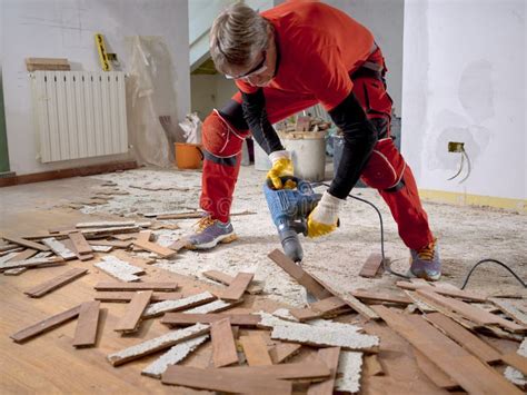 Parquet In Wood Glued To The Slab Removed With An Electric Demolition