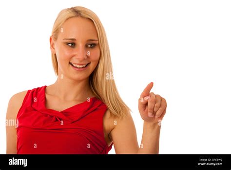 Business Woman In Red Shirt Pointing Into Copy Space Isolated Over