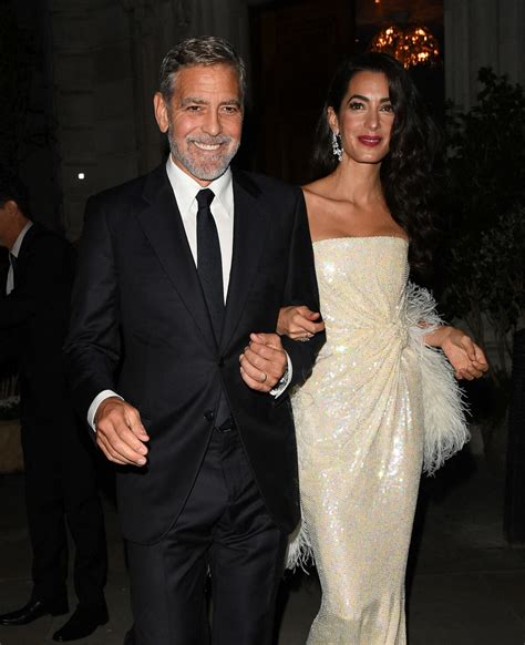 Photo George Clooney et sa femme Amal quittent l hôtel Nomad pour se