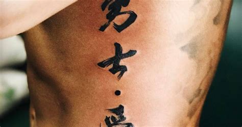 Lewis Hamilton shows off his new tattoo by Shao Gang