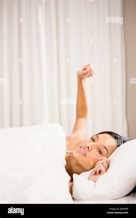 Attractive Brunette Waking Up Stock Photo Alamy