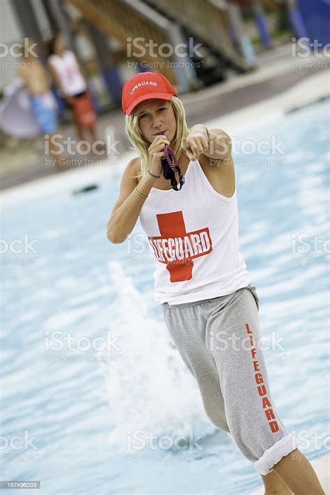 Female Lifeguard Pointing Stock Photo Download Image Now Lifeguard