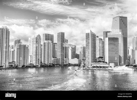 Miami Life Aerial View Of Miami Skyscrapers With Blue Cloudy Sky