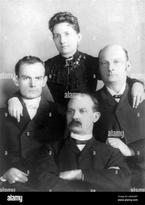 Members of the James–Younger Gang, sitting left-to-right: Bob Younger ...