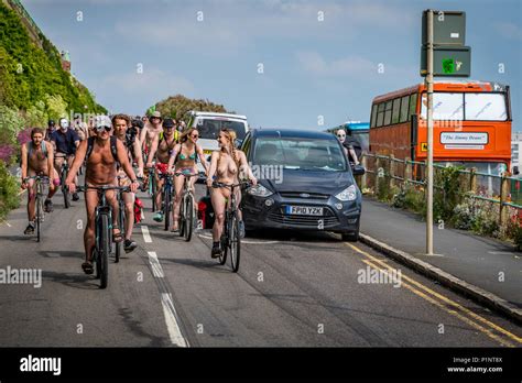 Nude Participants In The Brighton World Naked Bike Ride Using Nudity To Protest The Use Of