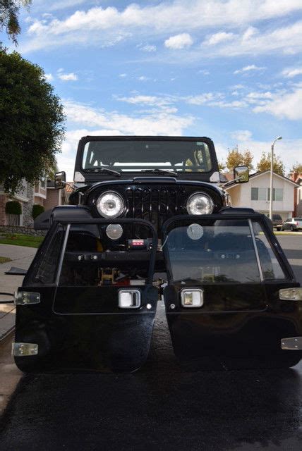 V8 Powered 1984 Jeep Cj7 With Genright Roll Cage And 4 Inch Rancho Lift