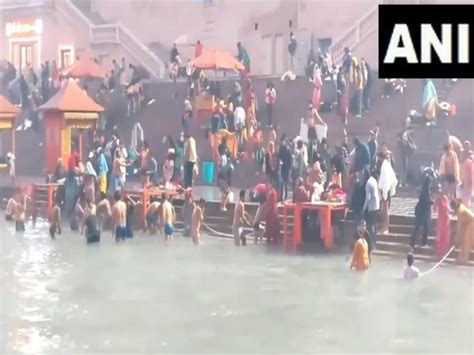 Devotees Take Holy Dip At Ayodhyas Saryu Ghat On The Occasion Of Makar