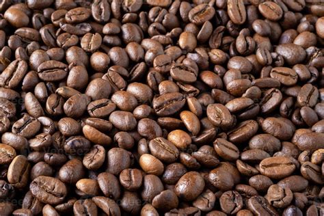 Roasted coffee beans background. 21698499 Stock Photo at Vecteezy