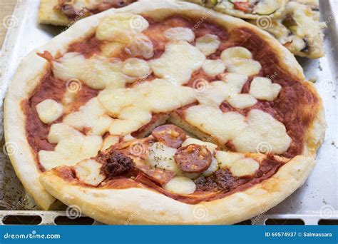 Round Homemade Pizza With Mozzarella And Spicy Salami Stock Image