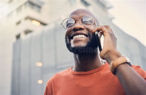 Black Man Smile And Phone Call Outdoor On A City Street With A