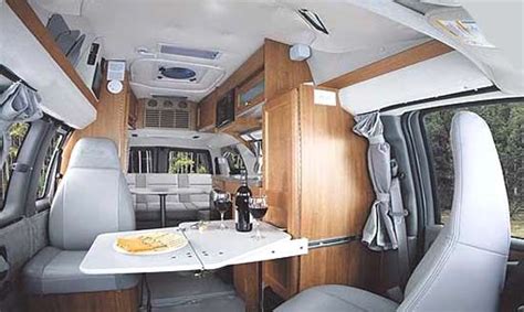 Roadtrek 170-Popular class B motorhome interior - seating and table arrangement | Roadtrek ...