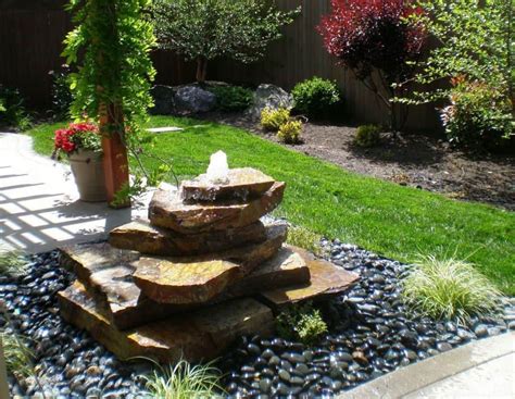 Backyard Garden With Flagstone Fountain And River Rocks Wonderful