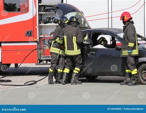 Firefighters In Action During The Road Accident Stock Photo Image Of