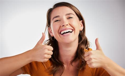 Premium Photo Happy Woman Portrait And Good Job With Thumbs Up For