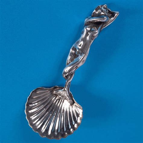 Cuillère coquille Sirène en métal argenté argent