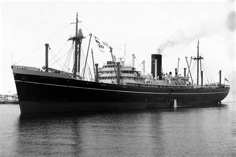 a large boat floating on top of a body of water