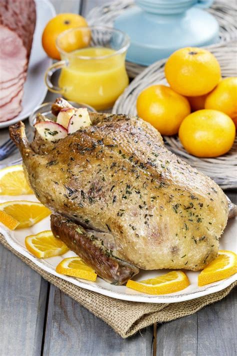 Roasted Duck With Oranges On Wooden Table Stock Photo Image Of