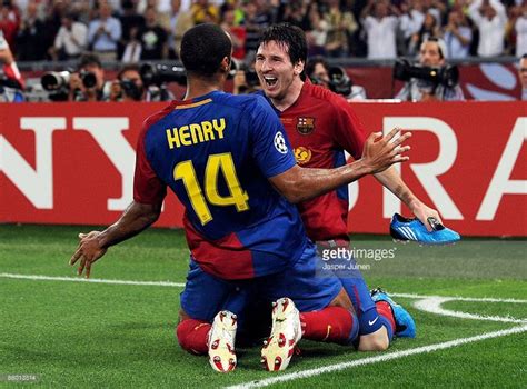 Lionel Messi Of Barcelona Celebrates With His Team Mate Thierry Henry