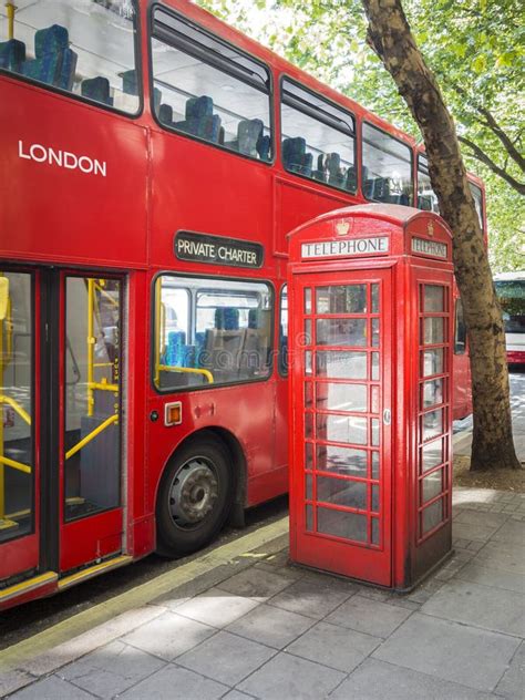 A Red Bus And Typical Phone Box Of London Stock Image Image Of