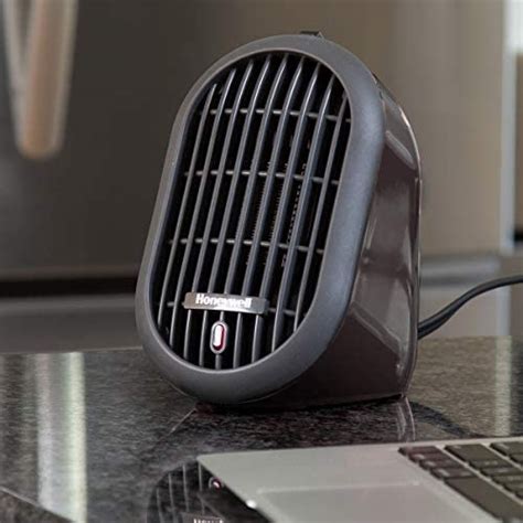 Honeywell HCE100B Heat Bud Ceramic Heater Black Energy Efficient Space Saving Portable Personal ...