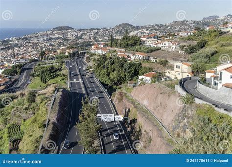 Aerial With Highway On Slopes Of Historical Town On Atlantic Ocean