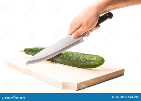 Cucumber On A Wooden Surface Fresh Cucumber On A Cutting Board