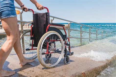 Premium Photo Accessible Beach With Wheelchair With Ramp For Persons