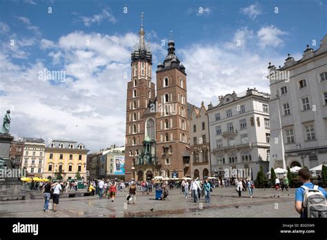 Main Market Square With St Mary S Basilica In The Background In Krakow