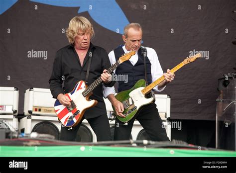 Status Quo Performing On The Pyramid Stage Glastonbury Festival 2009