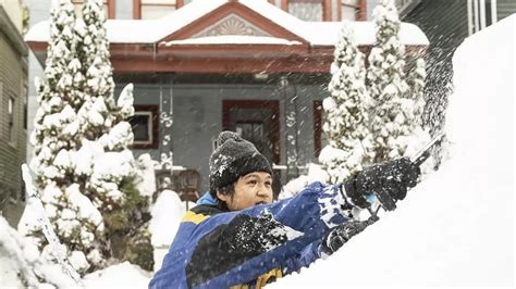 Heavy Snowfall Paralyzes Parts Of New York In Photos