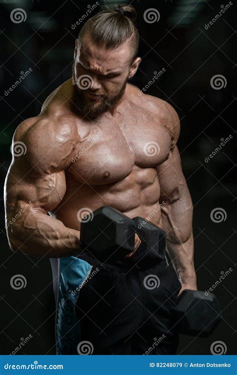 Brutal Strong Bodybuilder Athletic Men Pumping Up Muscles With D Stock