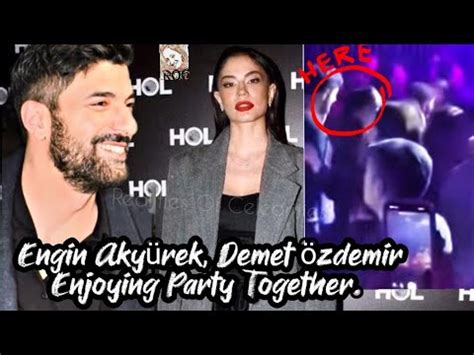 Engin Akyürek y Demet özdemir disfrutando juntos de una fiesta