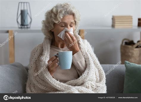 Sick Mature Woman Wrapped Blanket Blowing Running Nose Feeling