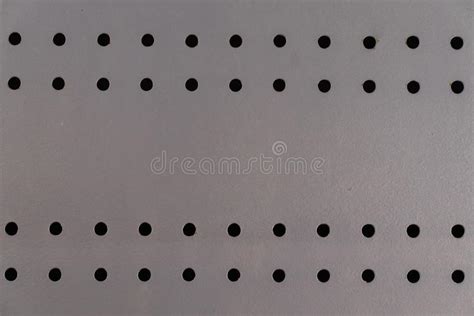 Detail Texture Of Steel Metal Plate With Holes Background Stock Photo