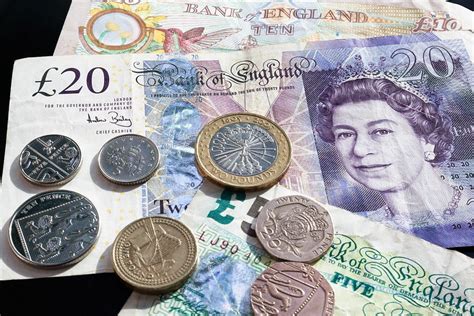 pound coins currency bank  photo  pixabay