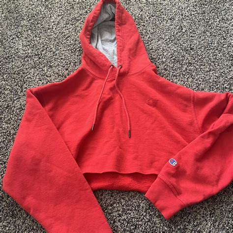 Champion cropped hoodie Size:L - Depop