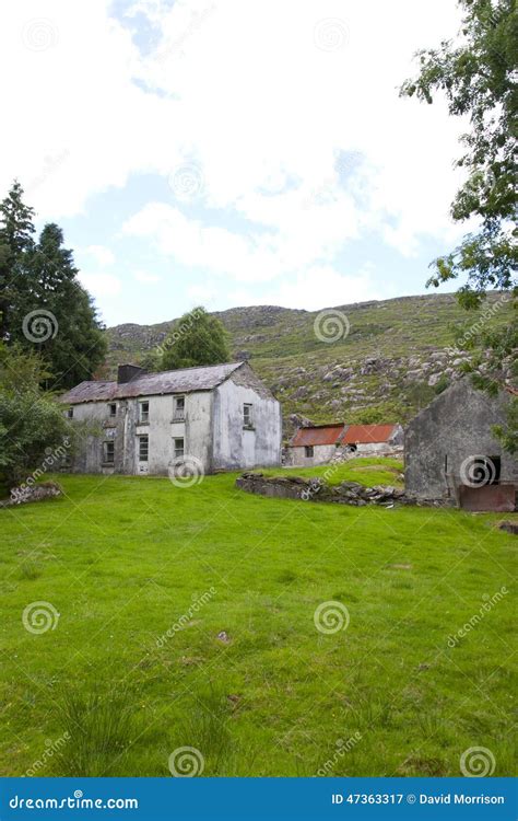 Irish Farmhouse And Castle With Sun Royalty Free Stock Photo