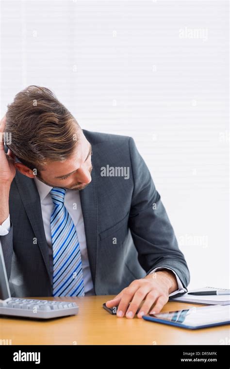 Businessman Sitting At Desk Hi Res Stock Photography And Images Alamy