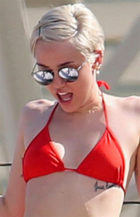 N Yo Face Miley Wears Tight Red Bikini