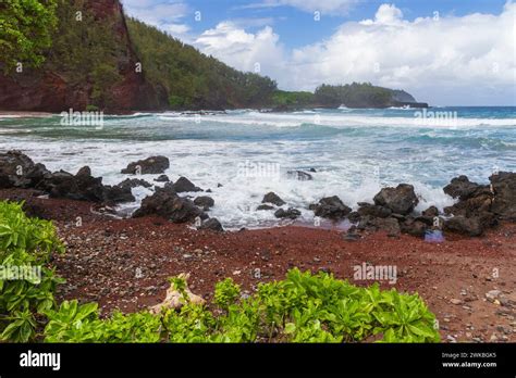 Kaihalulu Red Sand Beach Near The Village Of Hana On The Famous Road To Hana On The Island Of