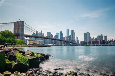 Long Exposure Of Brooklyn Bridge And Lower Manhattan New York Stock