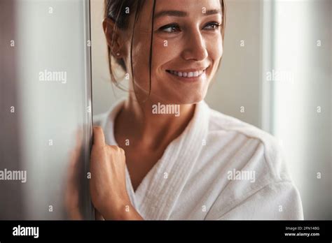 Brunette Caucasian Female With Dark Eyes Enjoys Resting In Spa Resort