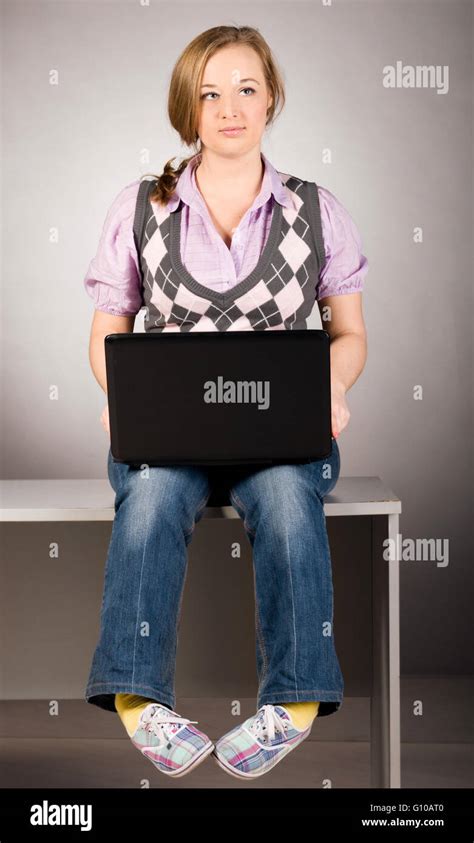 office woman with laptop Stock Photo - Alamy