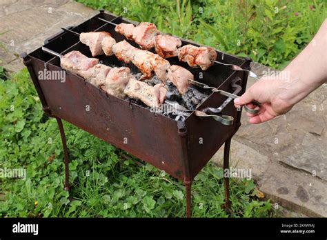 Pieces Of Meat Are Roasted On Hot Coals Stock Photo Alamy