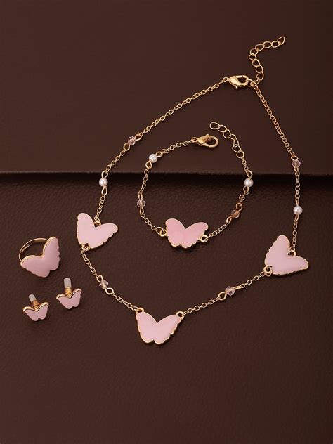 Buy Carlton London Girls Gold Plated Pink Pearl Studded Jewellery Set