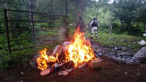 Destruye GN y Ejército campamento clandestino en Chinicuila Quadratín