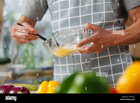 The Old Man Cooks In The Kitchen Stock Photo Alamy